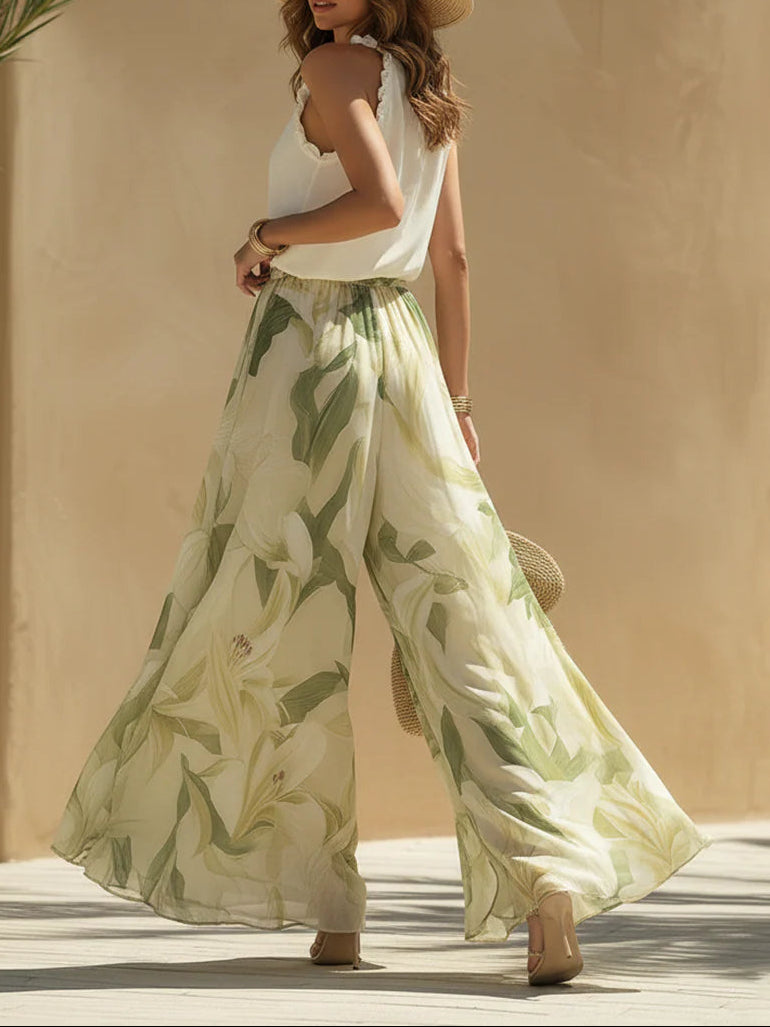 Mira - Top senza maniche in chiffon con balze e pantaloni a stampa giglio